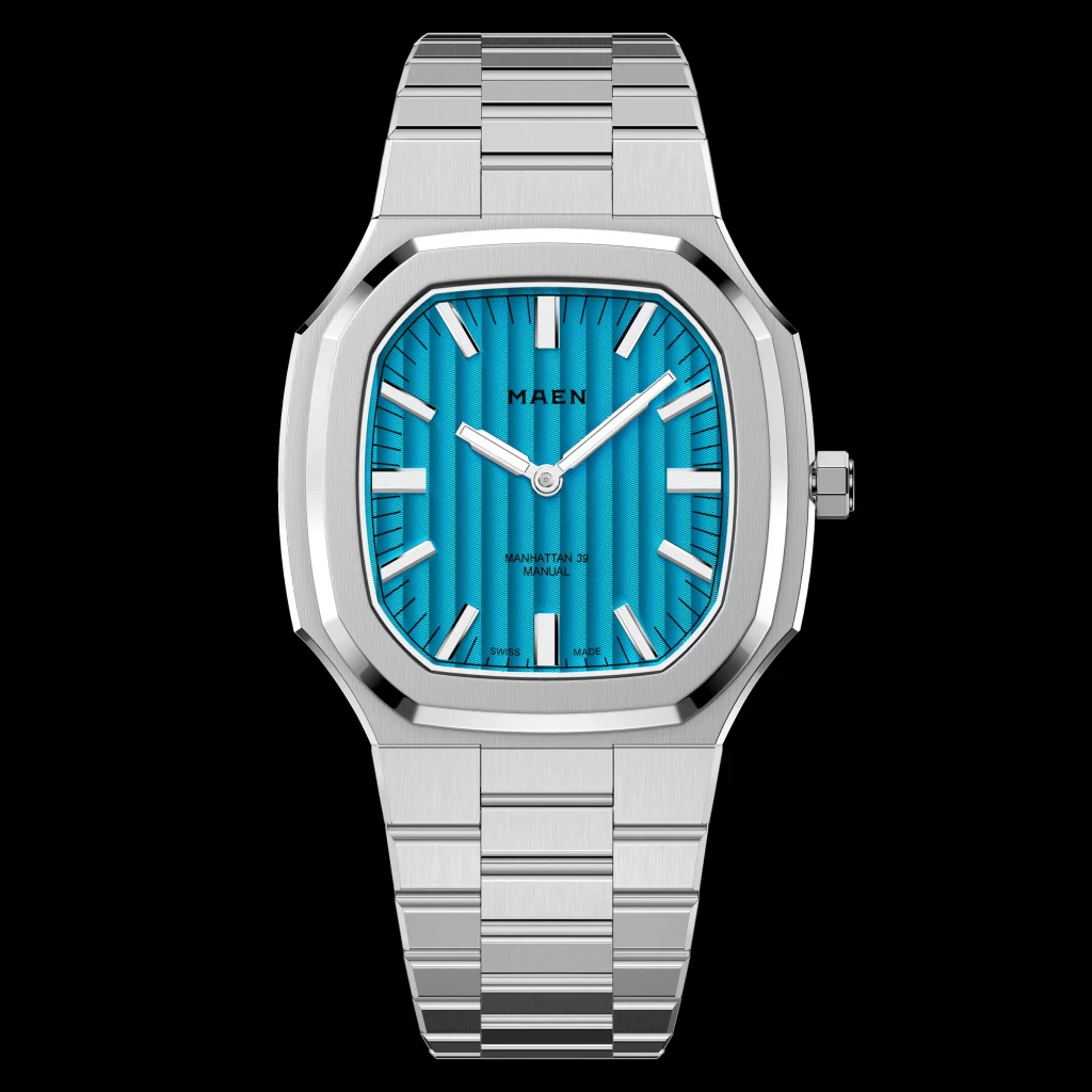 Maen Manhattan 39 Ultra-Thin: Retro-inspirierte Uhr mit blauem Sonnenschliff-Zifferblatt, ultraflachem Gehäuse und Edelstahlarmband.